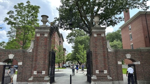 Students walk through a gate at Harvard University, Thursday, June 29, 2023, in Cambridge, Mass. The Supreme Court on Thursday struck down affirmative action in college admissions, declaring race cannot be a factor and forcing institutions of higher education to look for new ways to achieve diverse student bodies. (AP Photo/Michael Casey)