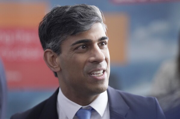 Britain's Prime Minister Rishi Sunak attends a visit to an engineering firm in Barrow-in-Furness, England, Monday, March 25, 2024. (Danny Lawson/PA via AP)