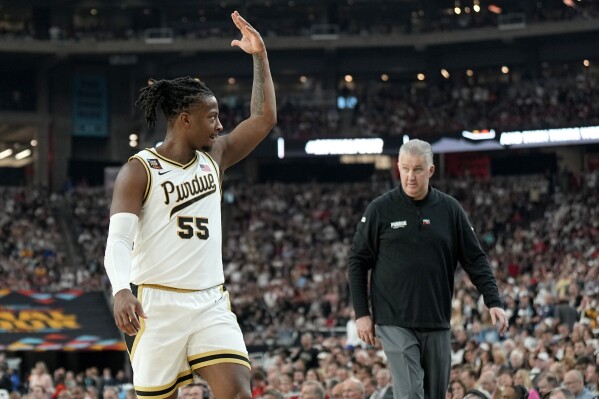 Purdue guard Lance Jones celebrates during the second half of the NCAA college basketball game against NC State at the Final Four, Saturday, April 6, 2024, in Glendale, Ariz. (AP Photo/Brynn Anderson )