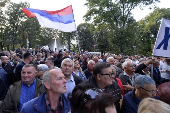 People protest against alleged election fraud in a general elections in the Bosnian town of Banja Luka, 240 kms northwest of Sarajevo, Thursday, Oct. 6, 2022. Opposition parties asking to open the bags and recount the votes for the President of Republika Srpska. (AP Photo/Radivoje Pavicic)