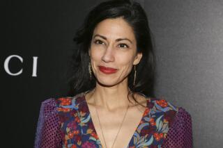 FILE - Huma Abedin attends a screening of "American Woman" on Dec. 12, 2019, in New York. Abedin has a memoir coming out this fall. The close aide to Hillary Clinton and estranged wife of disgraced former Rep. Anthony Weiner wrote "Both/And: A Life in Many Worlds.” Scribner told The Associated Press on Thursday that the book will be released Nov. 2. (Photo by Andy Kropa/Invision/AP, File)
