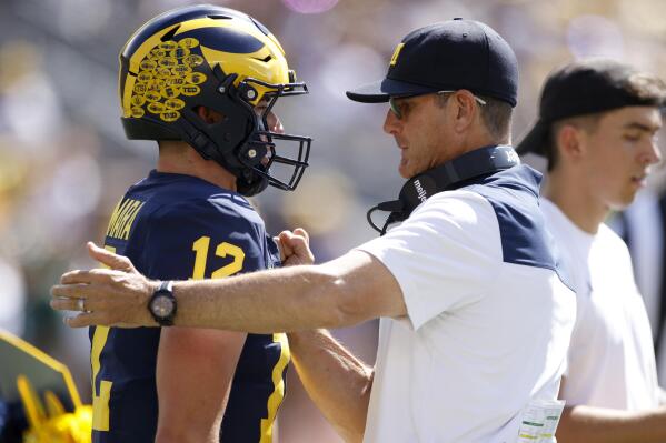 Michigan's Jim Harbaugh compares QBs to Kaepernick, Smith