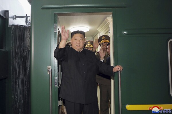 This Sept. 10, 2023 photo provided by the North Korean government shows that North Korea leader Kim Jong Un waves from a train in Pyongyang, North Korea, as he leaves for Russia. Independent journalists were not given access to cover the event depicted in this image distributed by the North Korean government. The content of this image is as provided and cannot be independently verified. Korean language watermark on image as provided by source reads: 