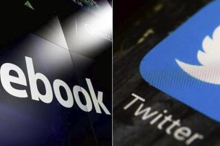 FILE - This combination of photos shows logos for social media platforms Facebook and Twitter. Social media companies are sharing their plans for safeguarding the U.S. midterm elections, although they are offering few specifics. Tech platforms like Facebook and Twitter are generally staying the course they were on in the 2020 voting season — which was marred by conspiracies and culminated in the Jan. 6 insurrection at the U.S. Capitol. (AP Photo, File)
