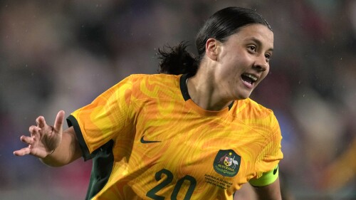 FILE - Australia's Sam Kerr celebrates after scoring against England during the women's international friendly soccer match between England and Australia at the Gtech Community Stadium in London, England, Tuesday, April 11, 2023. (AP Photo/Kin Cheung, File)