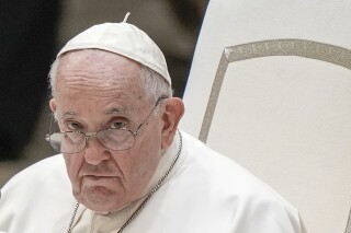 FILE - Pope Francis attends his weekly general audience in the Pope Paul VI hall at the Vatican, Wednesday, Aug. 23, 2023. Pope Francis in a speech to Catholic lawmakers has warned against social media reducing human relationships to “mere algorithms” and urged lawmakers to be vigilant against “partisan” propaganda and divisiveness on social media. In his speech on Saturday, Aug. 26, 2023 he said social media networks can help people realize they are part of something larger than themselves. (AP Photo/Andrew Medichini, File)