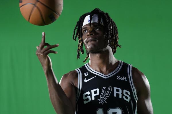 San Antonio Spurs forward Alize Johnson (19) poses for photos during the team's NBA basketball Media Day, Monday, Sept. 26, 2022, in San Antonio. (AP Photo/Eric Gay)