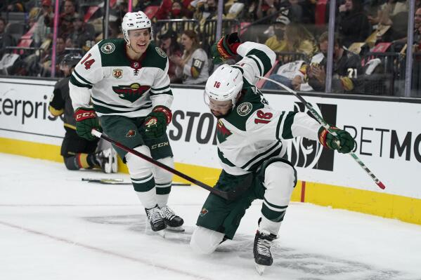 Minnesota Wild left wing Jordan Greenway (18) celebrates after scoring against the Vegas Golden Knights during the first period of an NHL hockey game Monday, May 24, 2021, in Las Vegas. (AP Photo/John Locher)