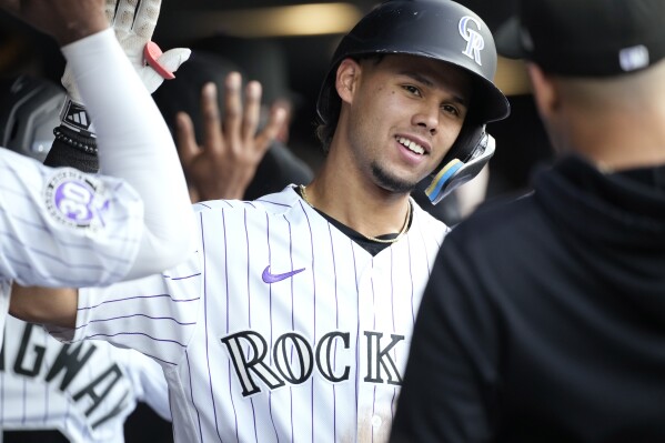 Tovar homers, extends his hitting streak to 13 games to help Rockies beat  Tigers 8-5
