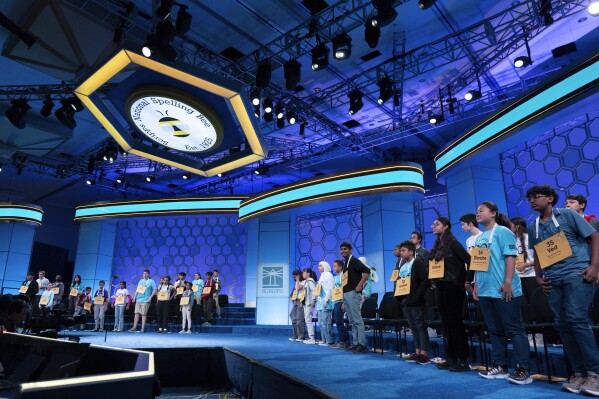Participants are standing up and standing up on Tuesday, May 27, 2025 at Oxon Hill, Maryland (AP Photo/Jose Luis Magana) as they compete in the first spare round of Scripps National Spelling Bee at Gaylord National Resort & Convention Center.