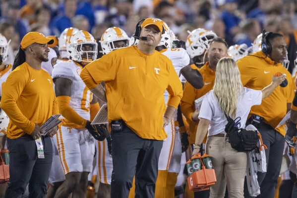 FILE - Tennessee head coach Josh Heupel looks at the scoreboard during the first half of an NCAA college football game against Kentucky in Lexington, Ky., Saturday, Oct. 28, 2023. (AP Photo/Michelle Haas Hutchins, File)
