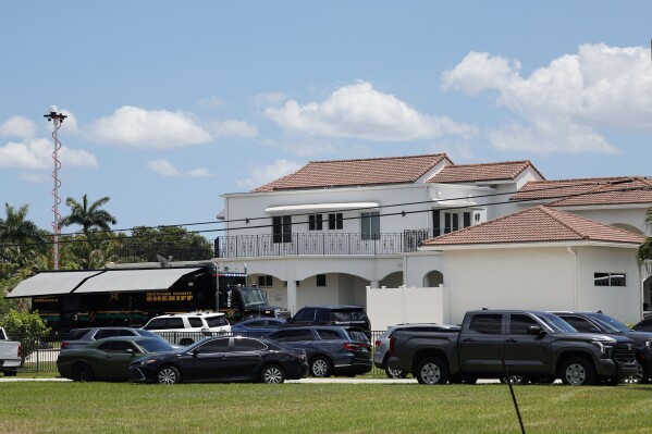 Sean Kingston's Southwest Ranches, Fla., home is shown during a raid by the Broward Sheriff's Office on Thursday, May 23, 2024. A SWAT team raided rapper Kingston's rented mansion on Thursday, and arrested his mother on fraud and theft charges that an attorney says stems partly from the installation of a massive TV at the home. Broward County detectives arrested Janice Turner, 61, at the home. (Amy Beth Bennett/South Florida Sun-Sentinel via AP)