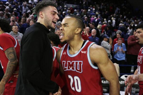 Loyola Marymount guard Cam Shelton (20) celebrates the team's 68-67 win against Gonzaga after an NCAA college basketball game, Thursday, Jan. 19, 2023, in Spokane, Wash. (AP Photo/Young Kwak)