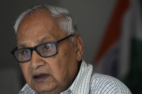 Niranjan Kapasi, 89, a retired journalist, talks to the Associated Press about the key issues in the national elections, in New Delhi, India, March 29, 2024. Kapasi blamed the entire political class for “manipulating the system by getting all the benefits with taxpayers money.” (AP Photo/Manish Swarup)