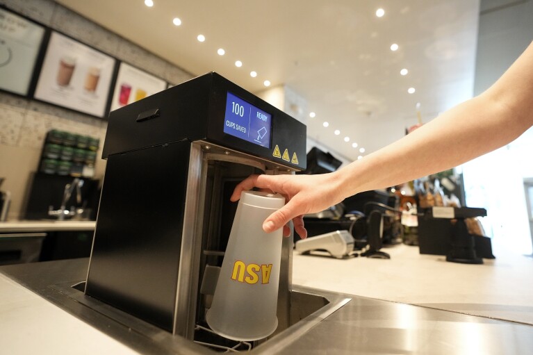 A reusable cup is washed at an Arizona State University Starbucks shop Wednesday, June 7, 2023, in Tempe, Ariz. (AP Photo/Ross D. Franklin)