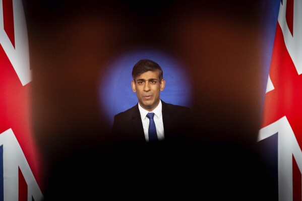 Britain's Prime Minister Rishi Sunak holds a press conference in the Downing Street Briefing Room in London, Thursday Dec. 7, 2023. (James Manning/Pool via AP)