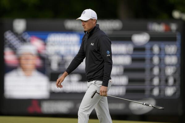 Jordan Spieth walks across the green on the 13th hole during second round of the Wells Fargo Championship golf tournament at the Quail Hollow Club on Friday, May 5, 2023, in Charlotte, N.C. (AP Photo/Chris Carlson)