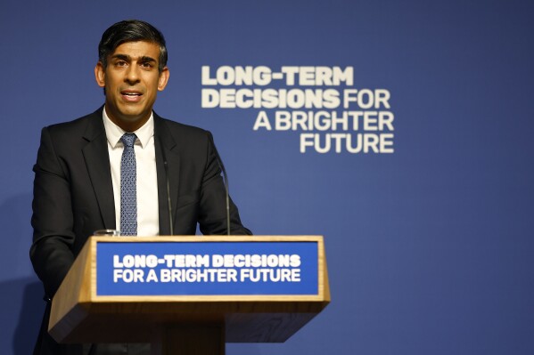 Britain's Prime Minister Rishi Sunak delivers a speech on AI at Royal Society, Carlton House Terrace, London, Thursday Oct. 26, 2023. The UK will host the first AI Safety Summit on Nov. 1 and 2 where world leaders and tech firms will convene to discuss the growing impact of AI. (Peter Nicholls/Pool via AP)
