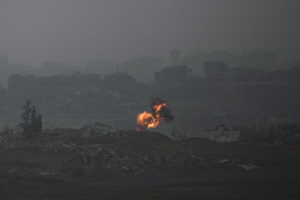 An explosion erupts in the northern Gaza Strip, as seen from southern Israel, on Tuesday, March 18, 2025. (AP Photo/Leo Correa)