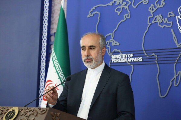 FILE - In this photo released on Aug. 11, 2022, by the Iranian Foreign Ministry, Foreign Ministry spokesperson Nasser Kanaani speaks in Tehran, Iran. Some $6 billion of Iranian assets once frozen in South Korea is in Qatar, a key element for a planned prisoner swap between Tehran and the United States, an Iranian official said Monday, Sept. 18, 2023. (Iranian Foreign Ministry via AP, File)
