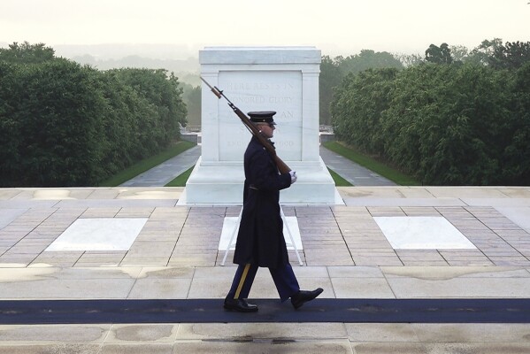 Army Sgt. 1st Class Andrew Jay patrols the Tomb of the Unknown Soldier, Thursday, May 15, 2025, at Arlington National Cemetery in Arlington, Va. (AP Photo/Mike Pesoli)