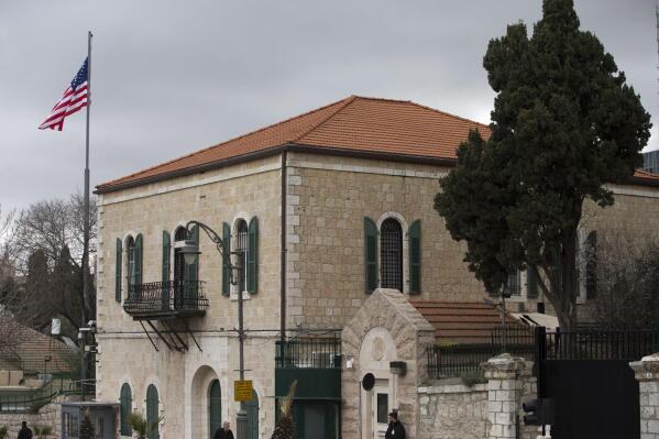 FILE - A flag of the United States flies outside the then US consulate building in Jerusalem, March 4, 2019. The Palestinians have slammed Israel for rejecting the promised reopening of the U.S. consulate in Jerusalem. The Palestinian Foreign Ministry said Sunday, Nov. 7, 2021, that Israel, as an occupying power, could not veto the U.S. decision. Israel says there is no room for another U.S. mission in Jerusalem. The Trump administration shuttered the U.S. Jerusalem consulate, an office that for years served as the de facto embassy to the Palestinians. (AP Photo/Ariel Schalit, File)