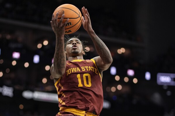Iowa State guard Keshon Gilbert shoots during the first half of an NCAA college basketball game against Houston in the championship of the Big 12 Conference tournament, Saturday, March 16, 2024, in Kansas City, Mo. (AP Photo/Charlie Riedel)