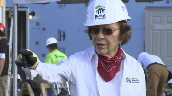FILE - Former U.S. First Lady Rosalynn Carter helps build a home in Memphis, Tenn., for Habitat for Humanity on Aug. 22, 2016. Rosalynn Carter turns 96 on Friday, Aug. 18, 2023 and is celebrating at home in Plains, Ga., with her family, including former President Jimmy Carter. Her plan includes eating cupcakes and peanut butter ice cream, then releasing butterflies in her garden -- with friends doing the same around the Carters' hometown. (AP Photo/Alex Sanz, file)