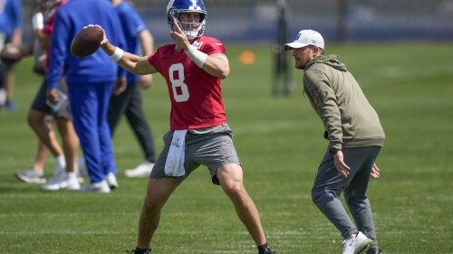 New York Giants quarterback Daniel Jones (8) performs a drill at the NFL football team's practice facility, Wednesday, May 31, 2023, in East Rutherford, N.J. (AP Photo/John Minchillo)
