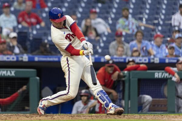 Philadelphia Phillies' Alec Bohm hits a two run home run during the seventh  inning of a baseball game against the Washington Nationals, Sunday, Sept.  11, 2022, in Philadelphia. (AP Photo/Laurence Kesterson Stock