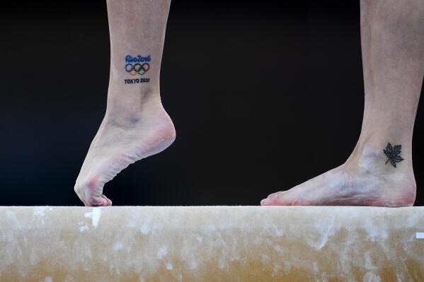 Shallon Olsen, of Canada, performs on the balance beam during the women's artistic gymnastic qualifications at the 2020 Summer Olympics, Sunday, July 25, 2021, in Tokyo. (AP Photo/Natacha Pisarenko)