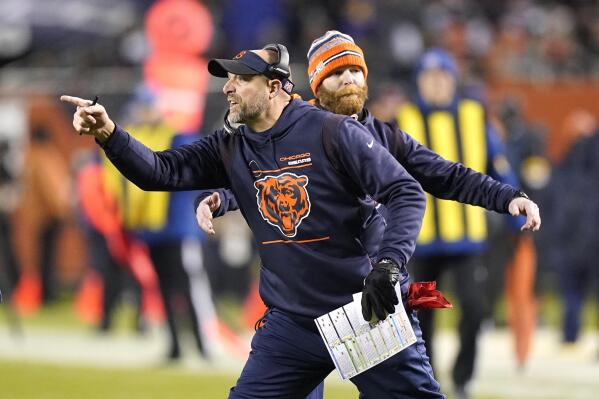 Chicago Bears head coach Matt Nagy points out onto the field during the second half of an NFL football game against the Minnesota Vikings Monday, Dec. 20, 2021, in Chicago. (AP Photo/Nam Y. Huh)