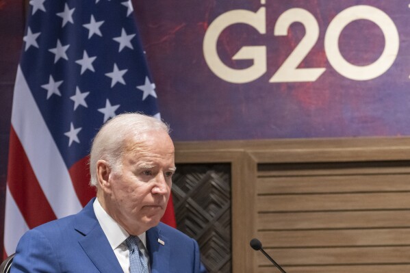 FILE - President Joe Biden pauses while speaking during a meeting with Indonesian President Joko Widodo on the sidelines of the G20 summit meeting, Monday, Nov. 14, 2022, in Bali, Indonesia. The White House announced Tuesday, Aug. 22, 2023, that President Joe Biden will attend next month's Group of 20 summit in New Delhi, India. (AP Photo/Alex Brandon, File)