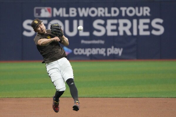 San Diego Padres' Ha-Seong Kim attends a baseball workout at the Gocheok Sky Dome in Seoul, South Korea, Tuesday, March 19, 2024. (AP Photo/Ahn Young-joon)