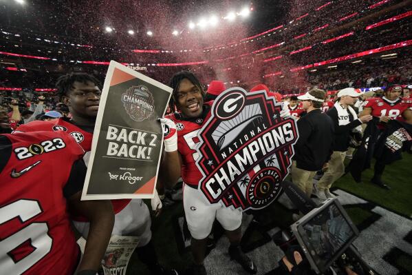 Georgia players celebrate a win over TCU after the national championship NCAA College Football Playoff game, Monday, Jan. 9, 2023, in Inglewood, Calif. Georgia won 65-7. (AP Photo/Ashley Landis)