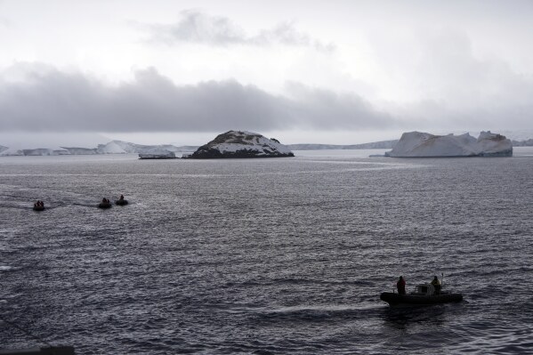 Boats of the Chilean Navy manuever at Bransfield Strait, Antarctica, Nov. 23, 2023. (AP Photo/Jorge Saenz)