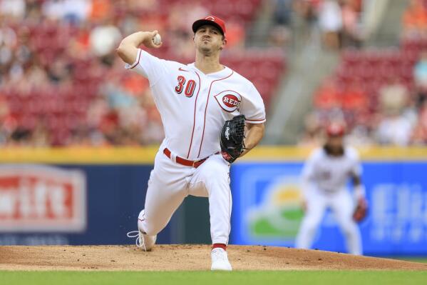 Cincinnati Reds' Tyler Mahle throws during the first inning of a baseball game against the Baltimore Orioles in Cincinnati, Saturday, July 30, 2022. (AP Photo/Aaron Doster)