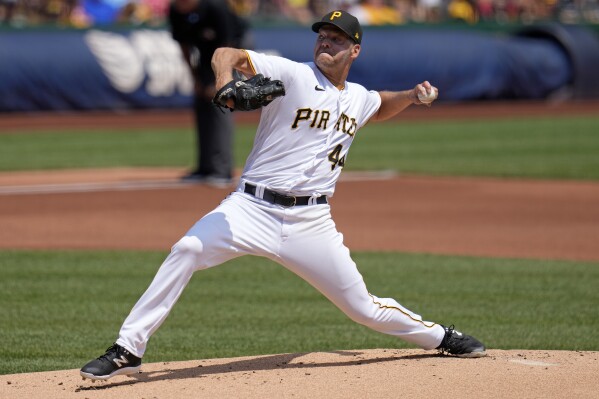 Pittsburgh Pirates starting pitcher Rich Hill delivers during the first inning of a baseball game against the Philadelphia Phillies in Pittsburgh, Sunday, July 30, 2023. (AP Photo/Gene J. Puskar)