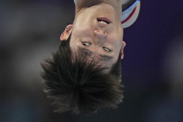 South Korea's Kim Hansol competes on his way to a gold medal in the Artistic Gymnastics Men's Floor Exercise for the 19th Asian Games in Hangzhou, China, Thursday, Sept. 28, 2023. (AP Photo/Ng Han Guan)