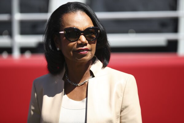 
              FILE- In this Sept. 16, 2018, file photo former Secretary of State Condoleezza Rice stands on the sidelines before the start of an NFL football game between the San Francisco 49ers and the Detroit Lions in Santa Clara, Calif. Cleveland Browns general manager John Dorsey says the team has not discussed Rice as a candidate for its coaching vacancy. Rice is an avid Browns fan and has visited the team's headquarters on numerous occasions in recent years. (AP Photo/Ben Margot, File)
            