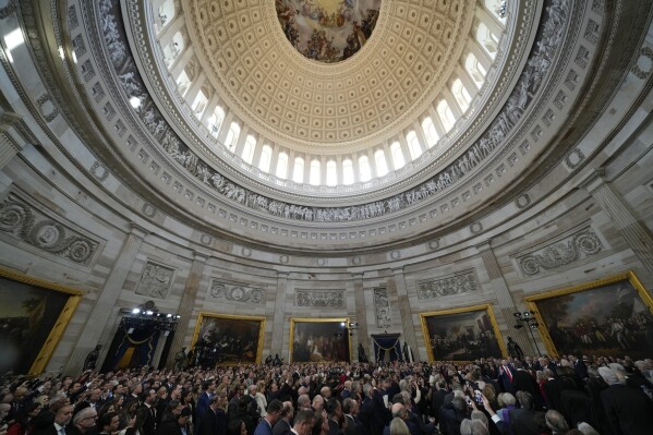 JD Vance is sworn in as vice president by Supreme Court Justice Brett Kavanaugh as Usha Vance holds the Bible during the 60th Presidential Inauguration in the Rotunda of the U.S. Capitol in Washington, Monday, Jan. 20, 2025. (AP Photo/Julia Demaree Nikhinson, Pool)