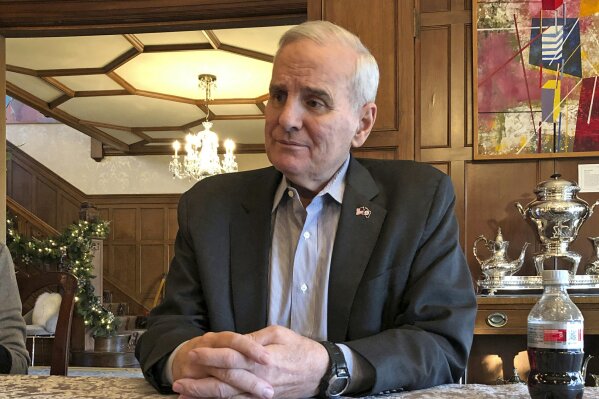 
              In this Dec. 14, 2018 photo, Democratic Minnesota Gov. Mark Dayton speaks during an interview with The Associated Press at the official Governor's Residence in St. Paul, Minn. Dayton says his proudest accomplishments in his 40 years of politics came late in his career: restoring state government to financial health and funding all-day kindergarten. The 71-year-old Dayton is preparing to retire next month. (AP Photo/Steve Karnowski)
            