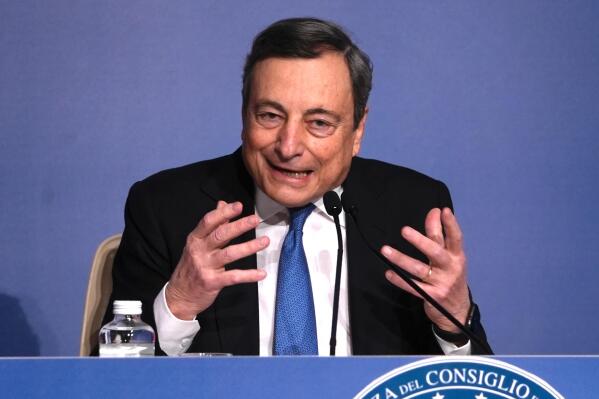 Italian Premier Mario Draghi attends the traditional year-end press conference in Rome, Wednesday, Dec. 22, 2021. (AP Photo/Domenico Stinellis)
