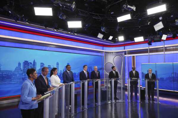 From left, Democratic mayoral candidates Adrienne Adams, Brad Lander, Jessica Ramos, Zellnor Myrie, Andrew Cuomo, Whitney Tilson, Zohran Mamdani, Michael Blake and Scott Stringer participate in a Democratic mayoral primary debate, Wednesday, June 4, 2025, in New York. (AP Photo/Yuki Iwamura, Pool)