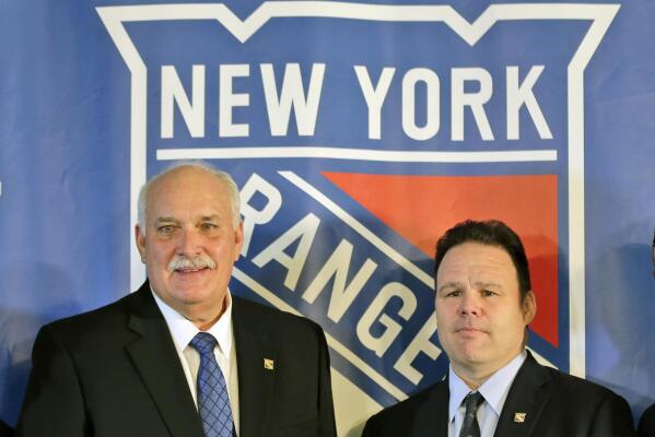 FILE - John Davidson, left, president of the New York Rangers, and Rangers general manager Jeff Gorton pose at a news conference in New York, in this Wednesday, May 22, 2019, file photo. The New York Rangers abruptly fired president John Davidson and general manager Jeff Gorton on Wednesday, May 5, 2021 with three games left in the season. Chris Drury was named president and GM. He previously served as associate GM under Davidson and Gorton. (AP Photo/Seth Wenig, File)