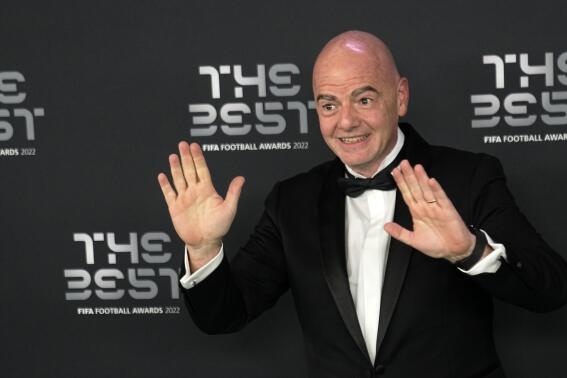 FIFA president Gianni Infantino gestures on the green carpet before the ceremony of the Best FIFA Football Awards in Paris, France, Monday, Feb. 27, 2023. (AP Photo/Michel Euler)