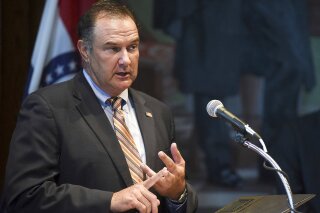 FILE - In this June 18, 2018, file photo, Missouri Lt. Gov. Mike Kehoe makes his opening statement during a news conference in the governor's office at the Missouri State Capitol in Jefferson City. Mo. Republican Lt. Gov. Kehoe said Monday, March 22, 2021, that he will not seek the Republican nomination in 2022 but will instead run for governor in 2024. (Emil Lippe/The Jefferson City News-Tribune via AP, File)