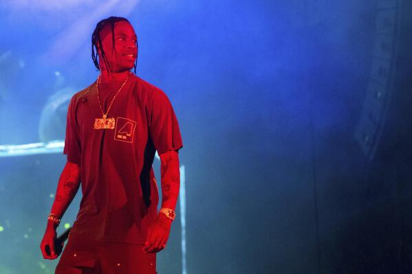 FILE - In this Sept. 15, 2019 file photo, Travis Scott performs during Day 2 of Music Midtown in Atlanta. In April 2021, Scott was honored for his work as one of five recipients of the inaugural RAD impact awards. Scott plans to give “several” scholarships to HBCU students with the funds. (Photo by Paul R. Giunta/Invision/AP, File)