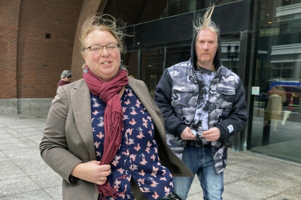FILE - Attorney Jane Peachy, left, and client William Giordani, of Nashua, N.H., walk out of federal court in Boston, Wednesday, Jan. 10, 2024. Giordani, 55, accused of participating in a plot in which a caller issued bomb threats last year to Harvard University and demanded a large amount of bitcoin, has been sentenced to three years probation Thursday, April 25, 2024. (AP Photo/Steve LeBlanc, File)