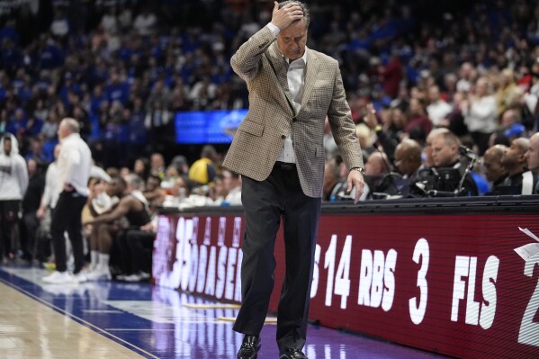 Kentucky head caoch John Calipari walks on the sideline in the final seconds of the Wildcats' loss to Texas A&M in an NCAA college basketball game at the Southeastern Conference tournament Friday, March 15, 2024, in Nashville, Tenn. (AP Photo/John Bazemore)